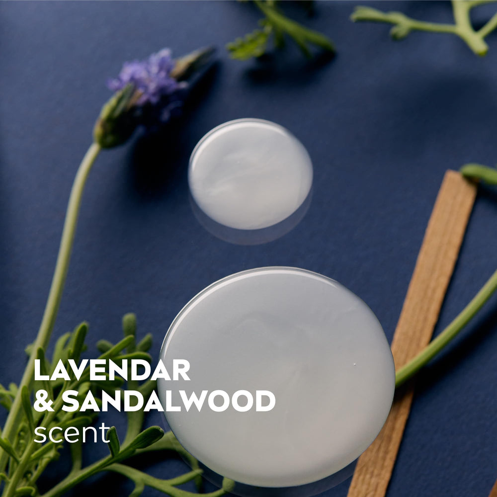 Lifestyle shower scene conveying a relaxing mood with lavender-sandalwood