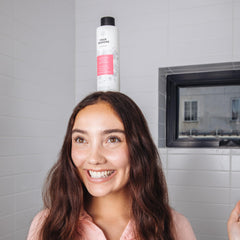 No Nothing Sensitive Shampoo pour shot showcasing fragrance-free formula for sensitive scalps.
