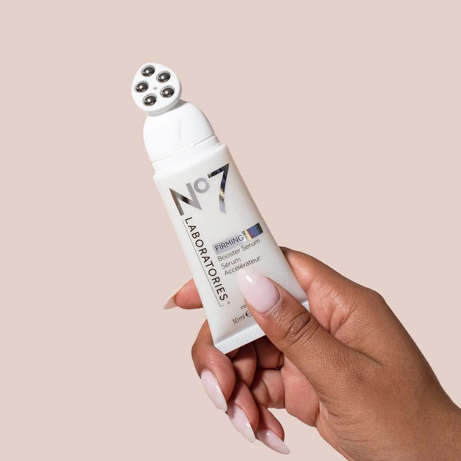 No7 Firming Booster serum swirl displaying rich texture and hydration benefits