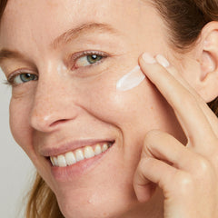 No7 Lift & Luminate night cream application on skin suggests overnight hydration.