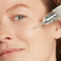 No7 Line Correcting Booster Serum texture swatch reveals light, hydrating feel for aging skin.