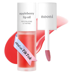 Envase compacto del aceite labial NOONI Appleberry para retoques rápidos.
