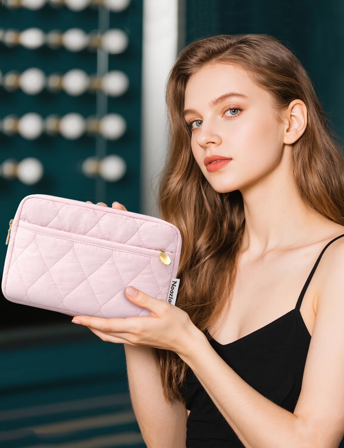 Noozion makeup bag water-resistant exterior protects contents from spills while traveling