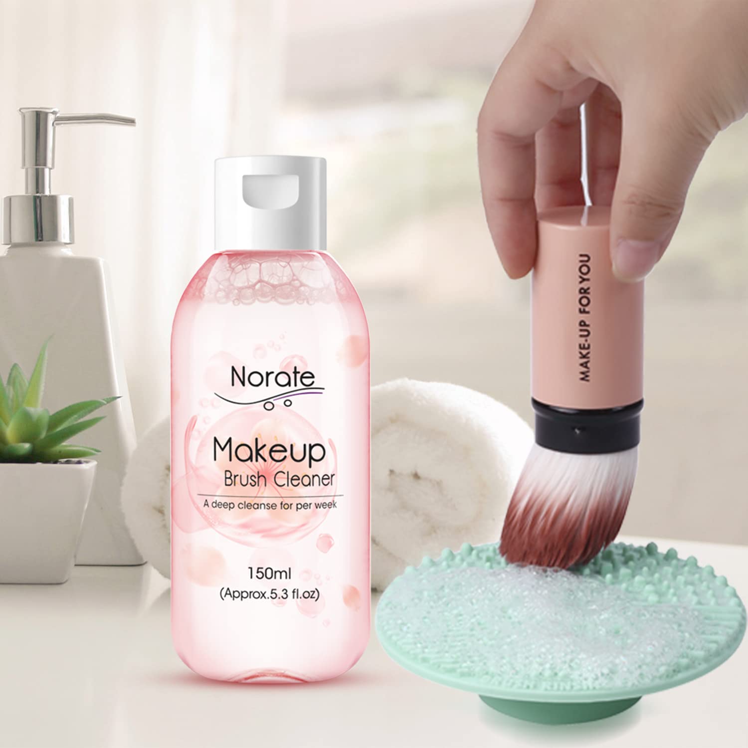 Norate cleaner mat shown with various brushes for quick, thorough cleaning