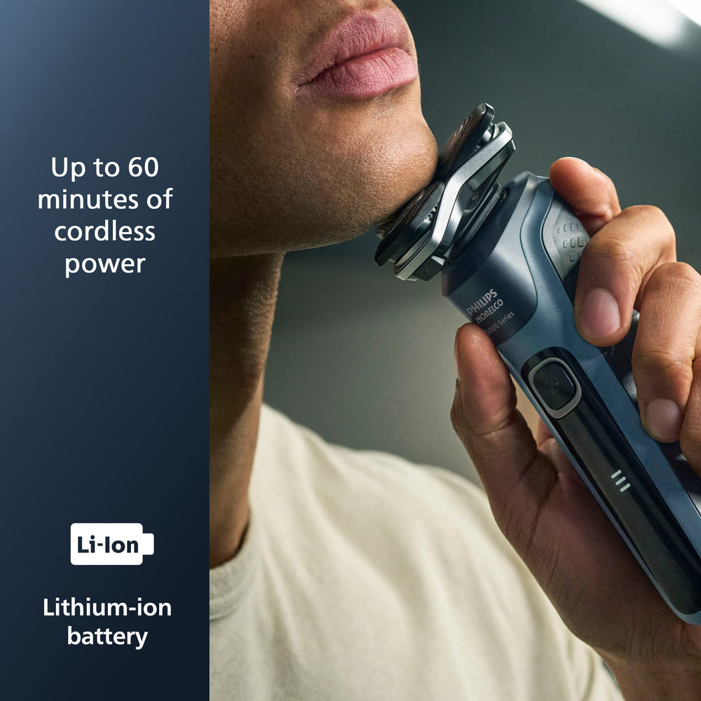 Norelco 5400 shaver LED display shows battery status at a glance.