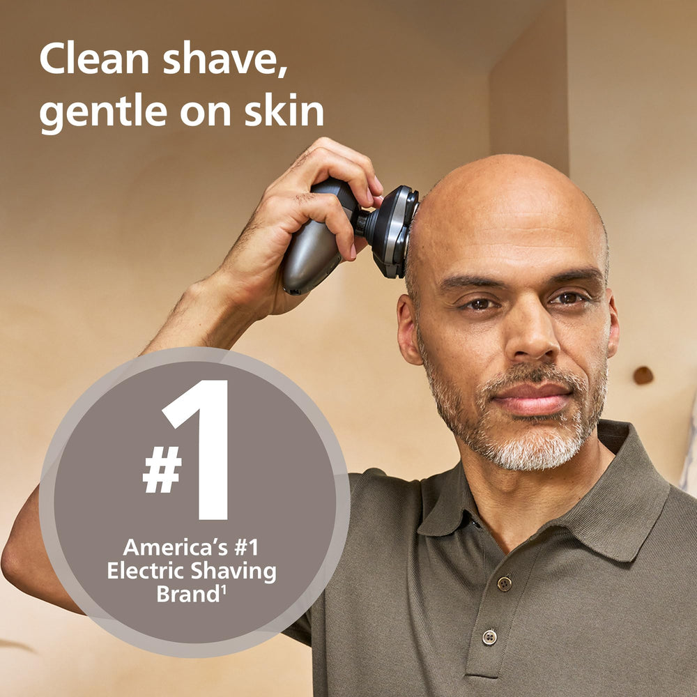 Norelco Pro 7000 contoured head maintains even skin contact on the scalp