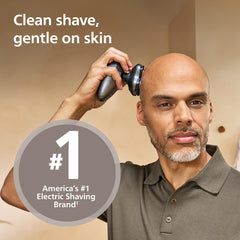 Norelco Pro 7000 contoured head maintains even skin contact on the scalp