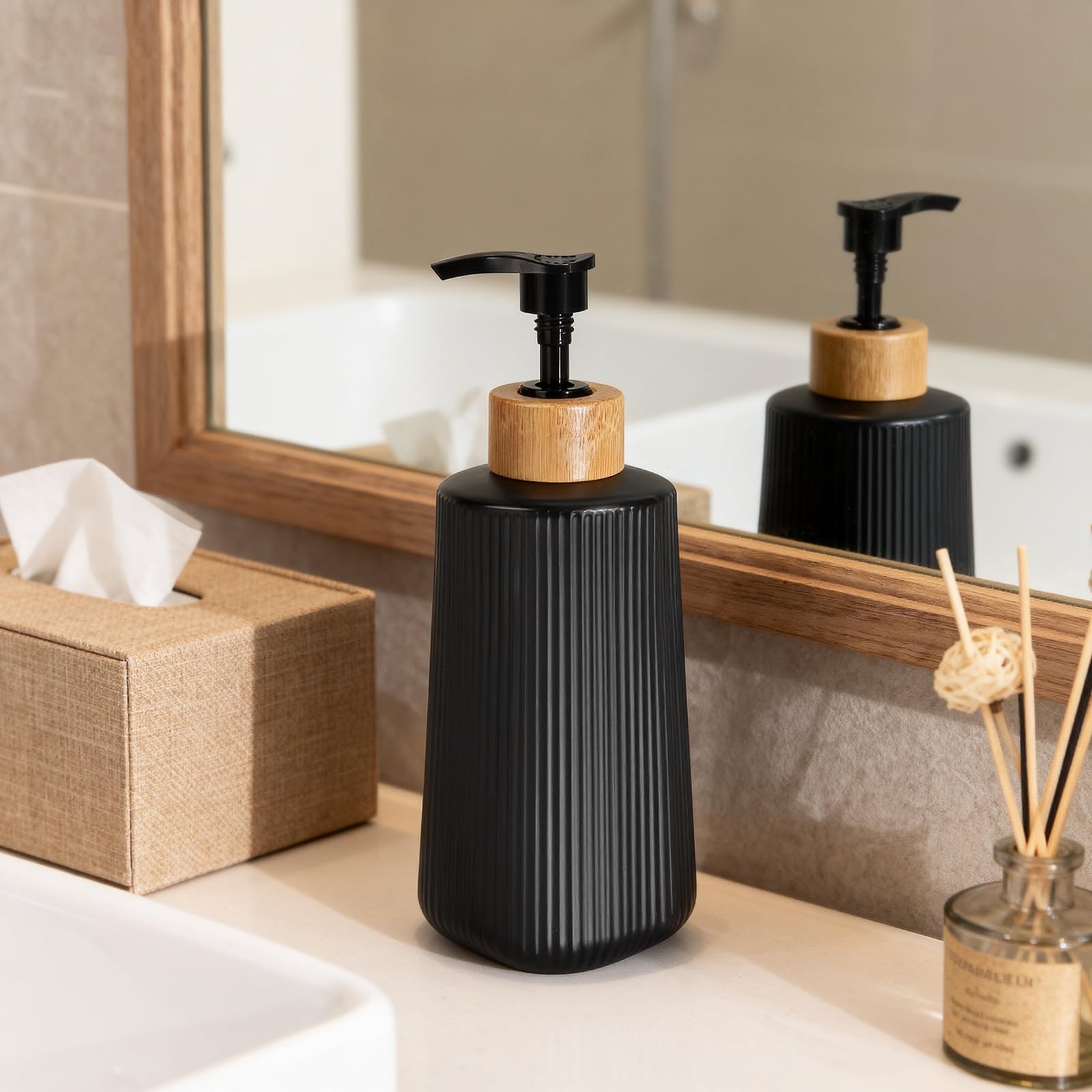 Nortsa Miira twelve-ounce capacity dispenser ready for hand soap or shampoo.