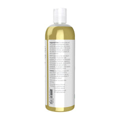 Pouring NOW Foods Jojoba Oil into the hand for quick absorption