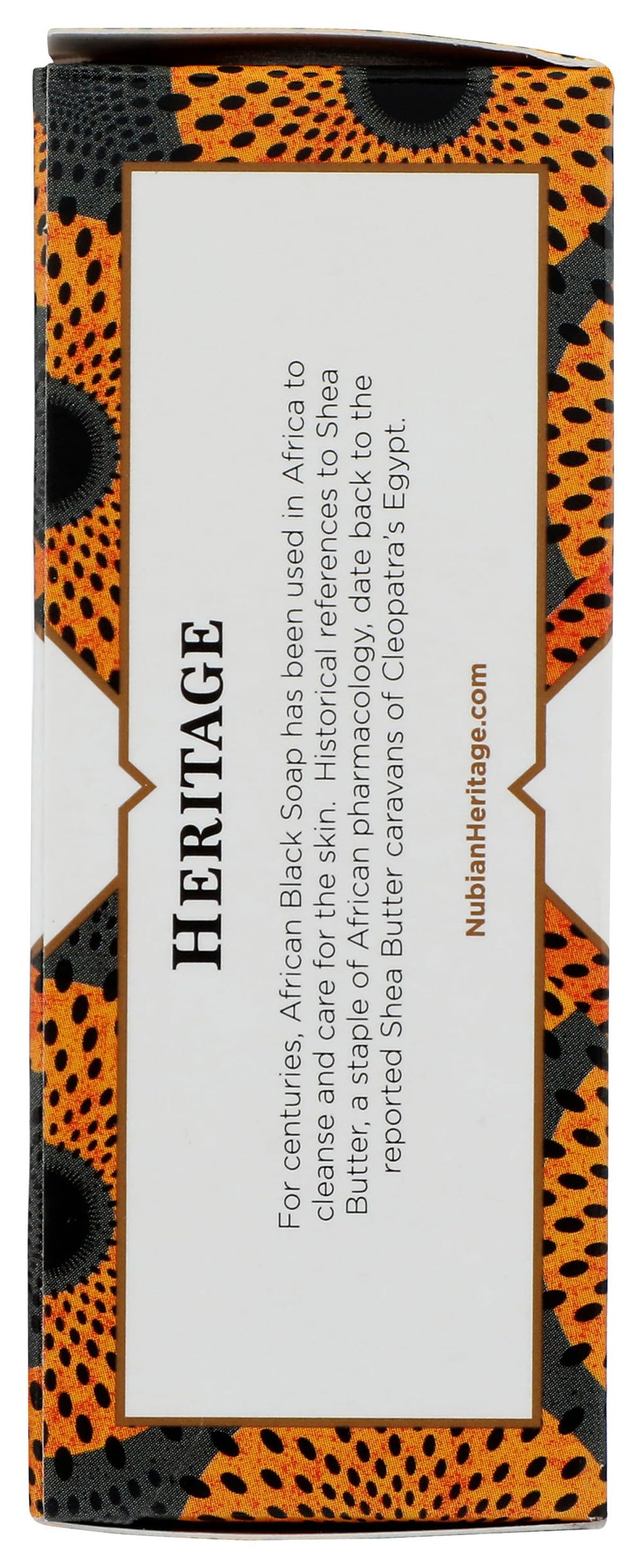 Nubian Heritage African Black Soap Bar used for body cleansing in shower.