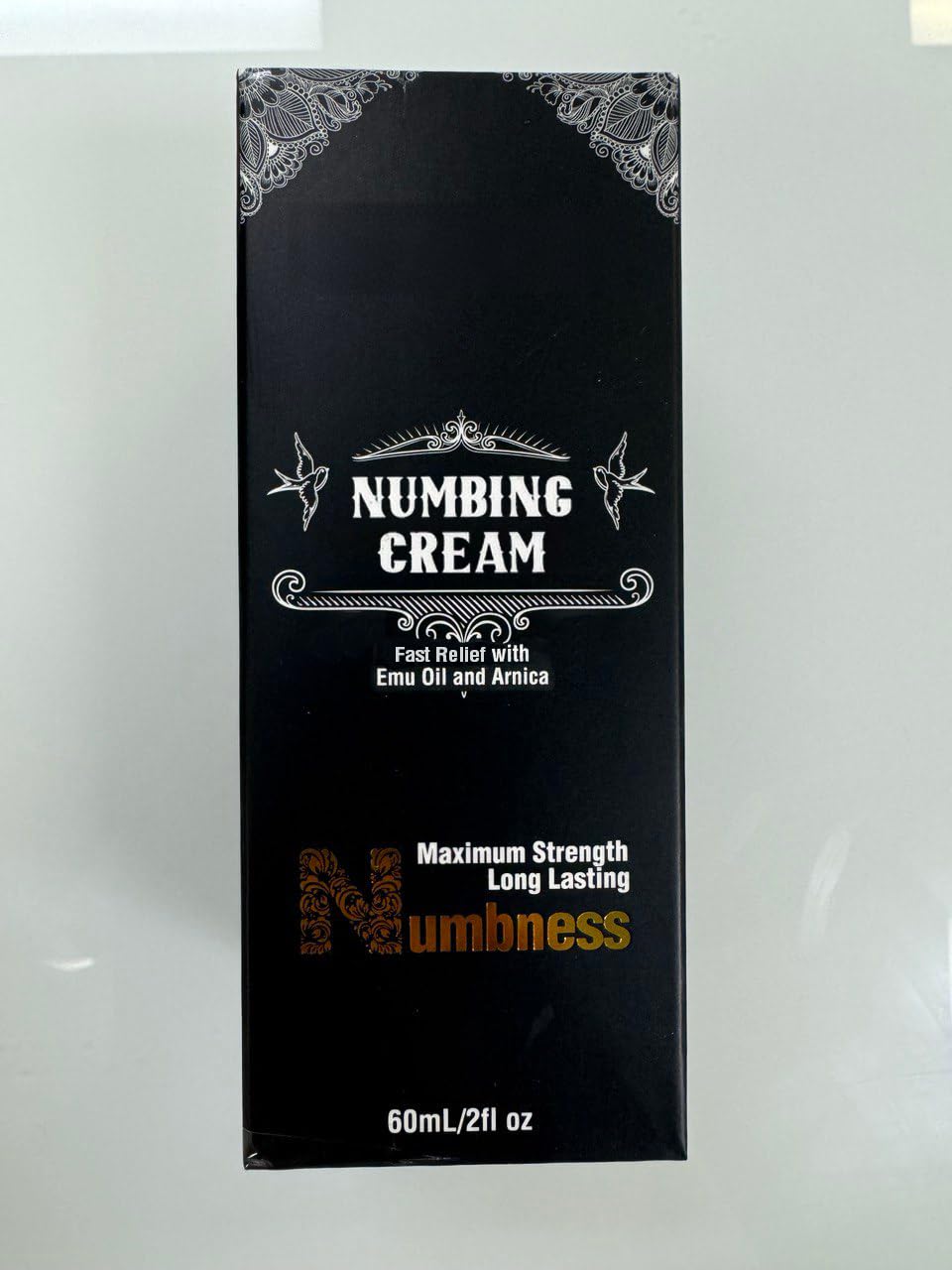 Nupharmco Numbing Cream after-application scene with clean towel for quick cleanup.