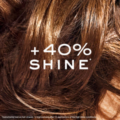 Silicone-free formula texture close-up showing silky hair potential.