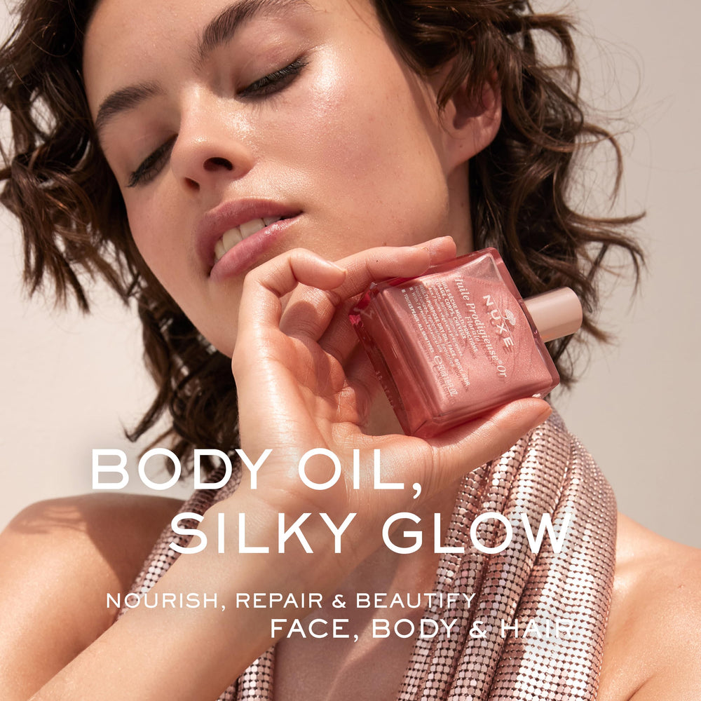 Nuxe Huile Prodigieuse Florale rose-gold glow swirls on skin