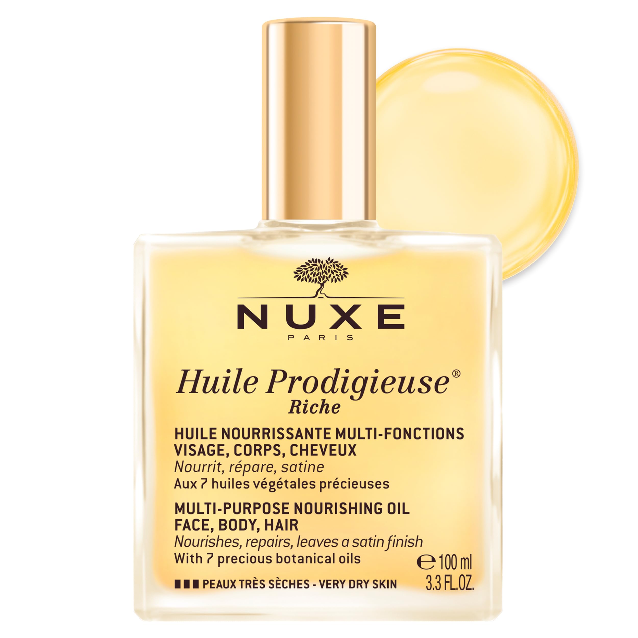 Nuxe Huile Prodigieuse Riche bottle pouring oil for nourishing skin