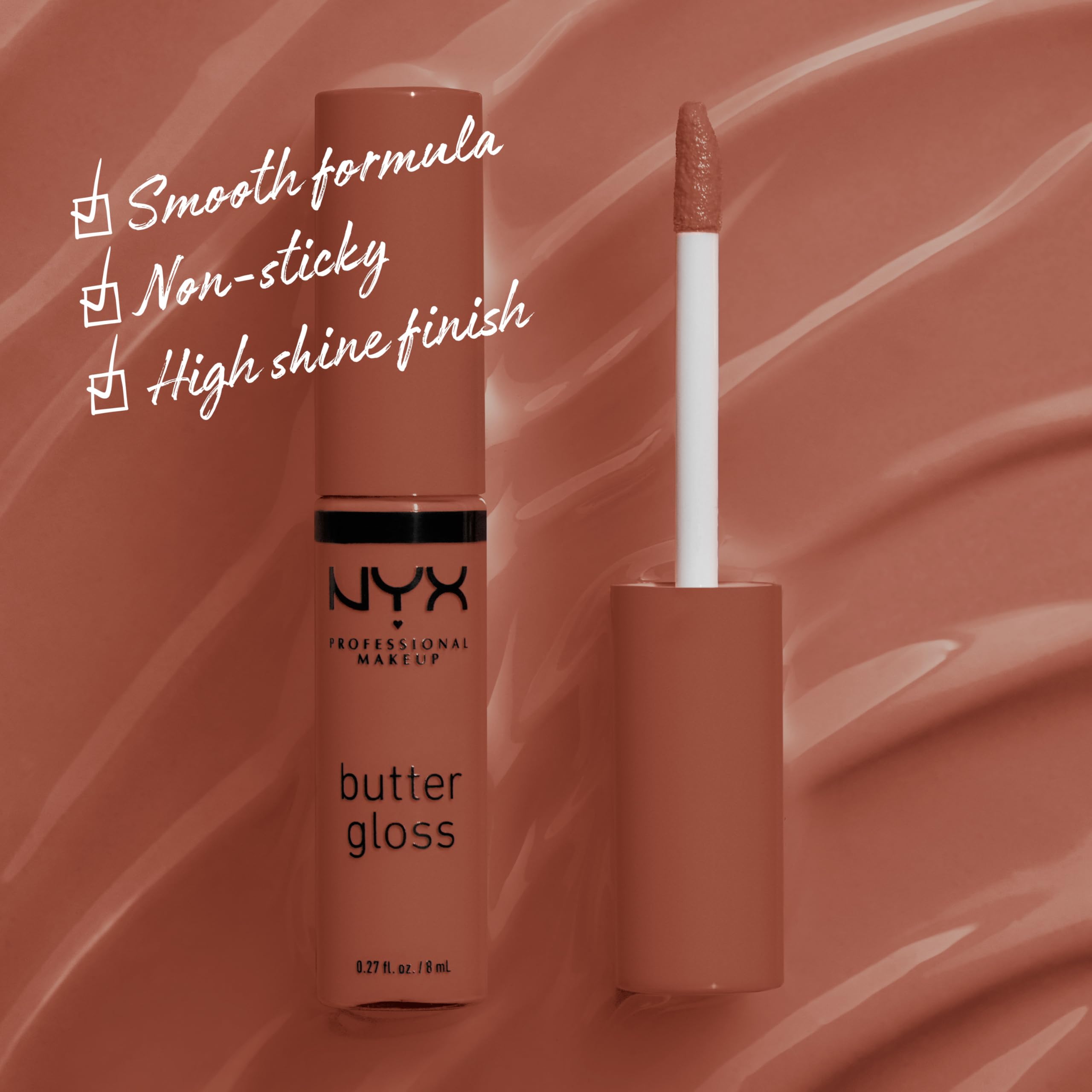 NYX Butter Gloss Bit Of Honey arm swatch showing sheer to medium coverage