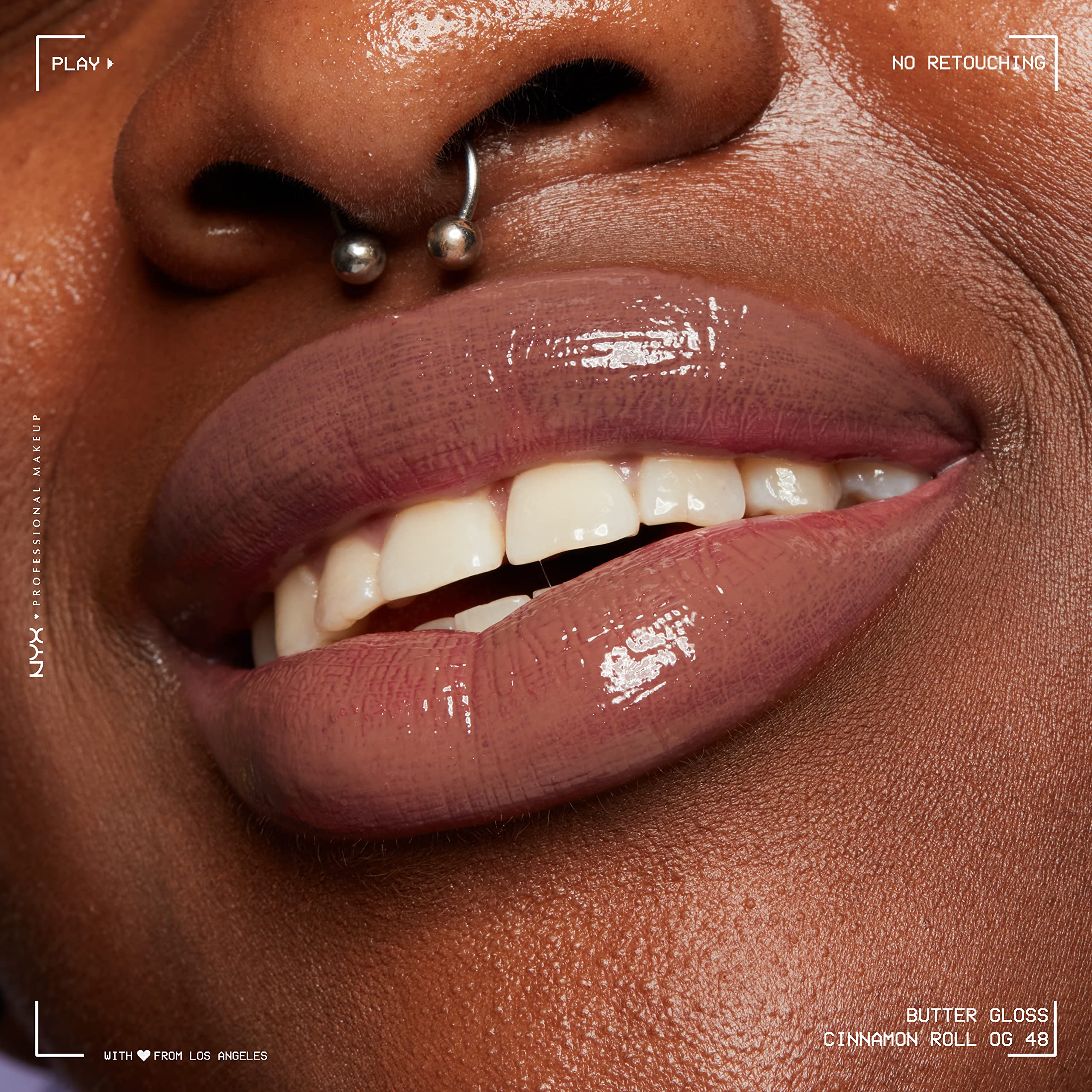 NYX Butter Gloss Brown Sugar Cinnamon Roll shade on lips.