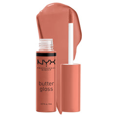 NYX Professional Makeup Butter Gloss Brown Sugar swatches show a peachy nude shade for warm undertones.
