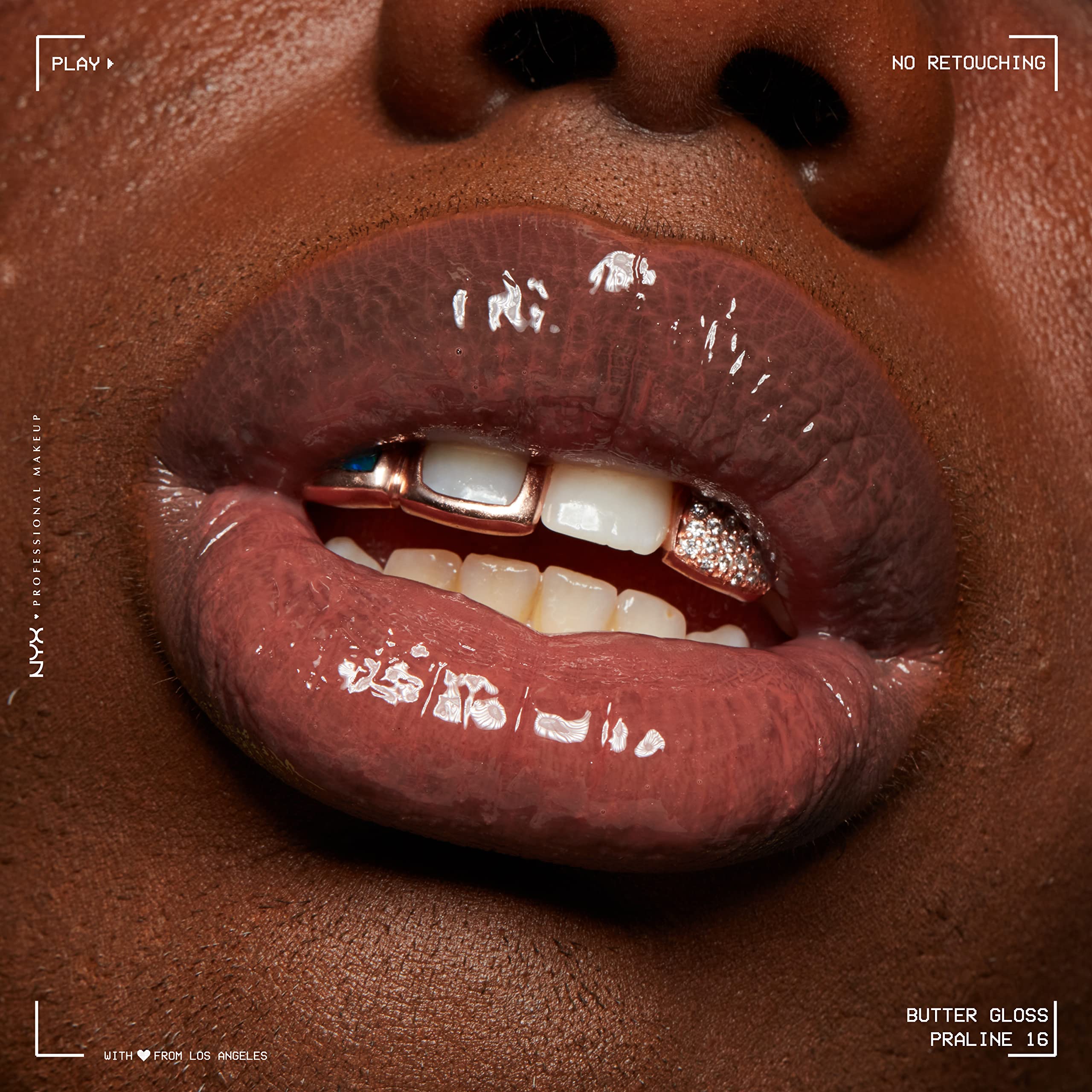 Shiny, glossed lips detail with a non-sticky finish and soft glow.