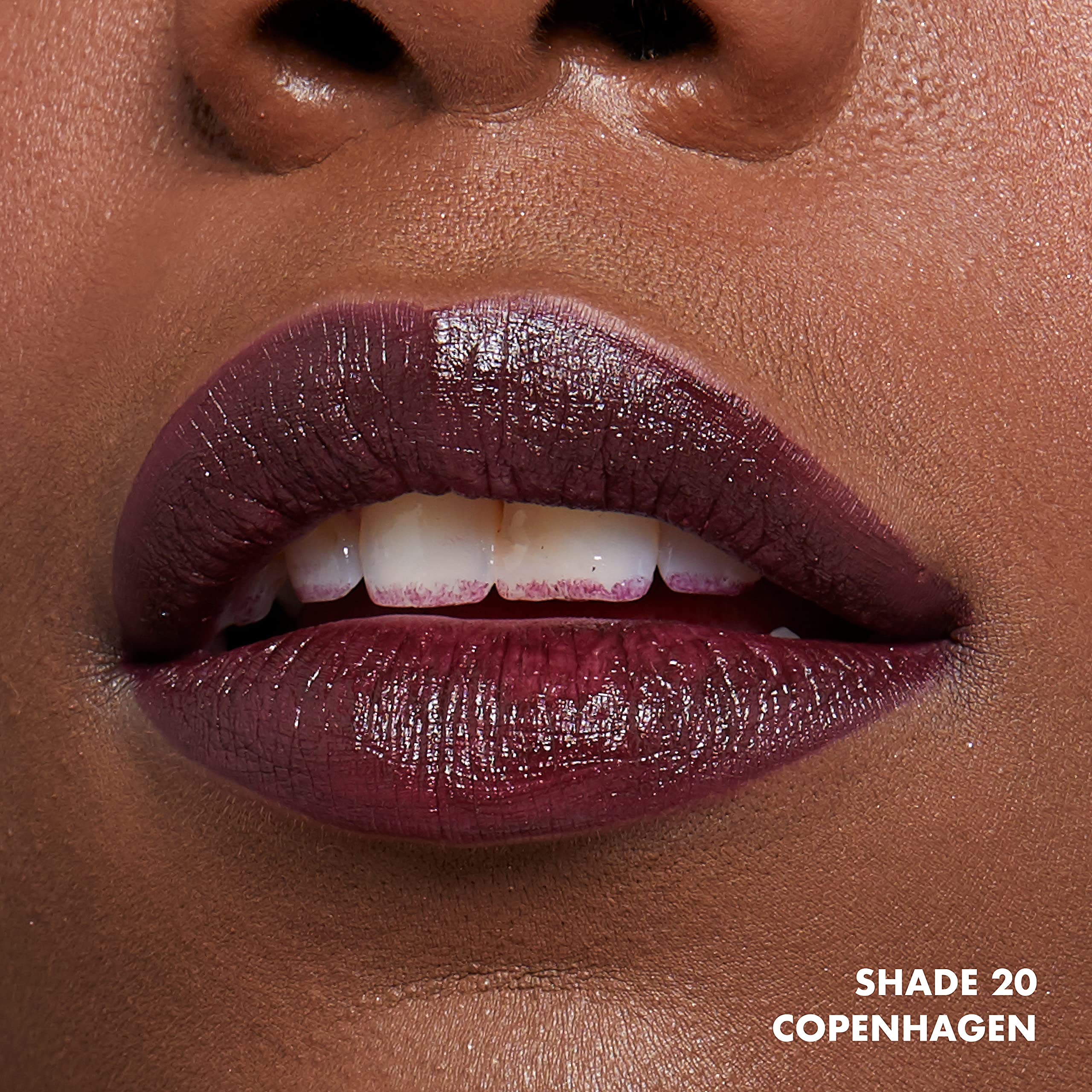NYX Soft Matte Lip Cream Plum swatch reveals bold plum color on lips.