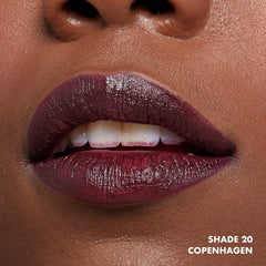 NYX Soft Matte Lip Cream Plum swatch reveals bold plum color on lips.