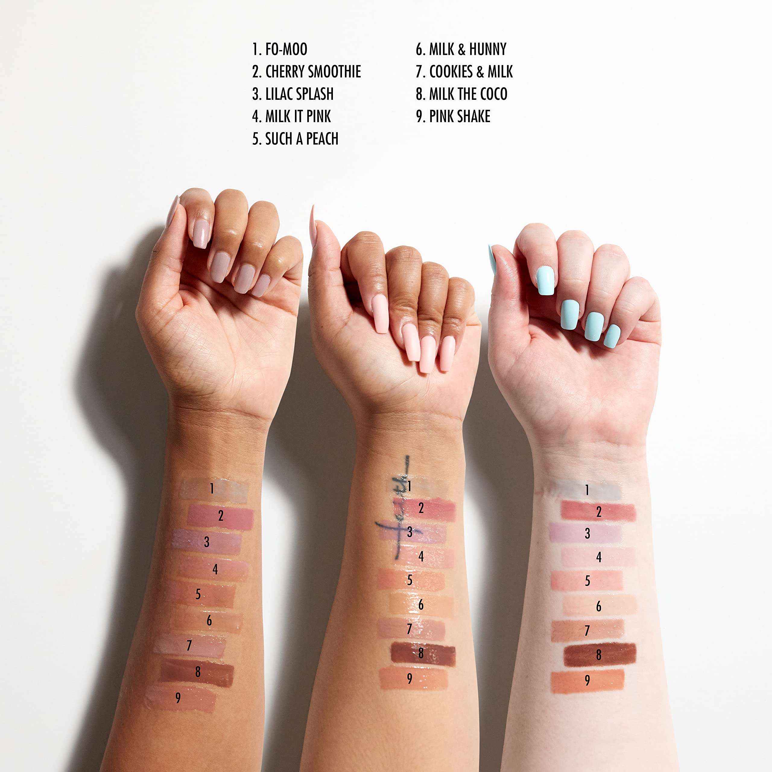 NYX This Is Milky Gloss swatch on arm demonstrates buildable milky color and shine.