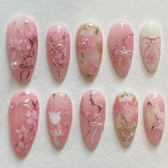 NZRAESTRS uñas postizas con flores rosas y perlas para un look elegante