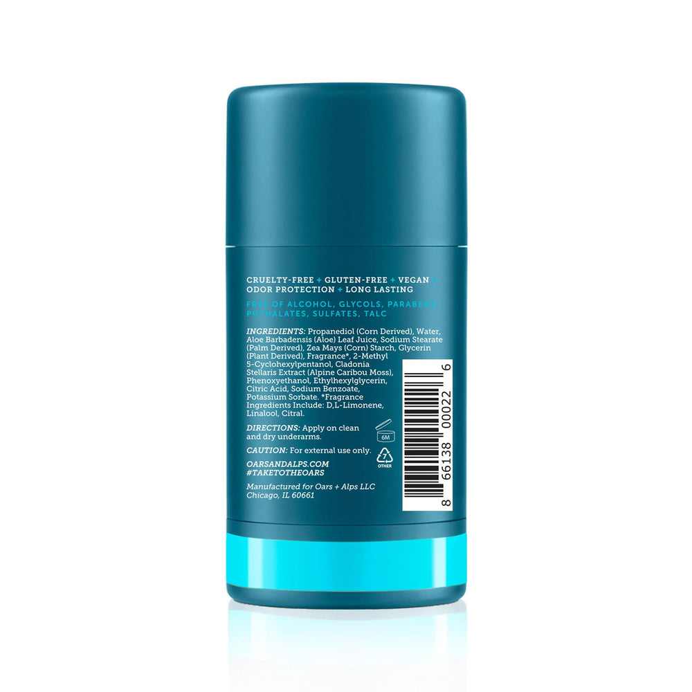Oars + Alps deodorant tube application shows smooth glide and quick-dry finish.