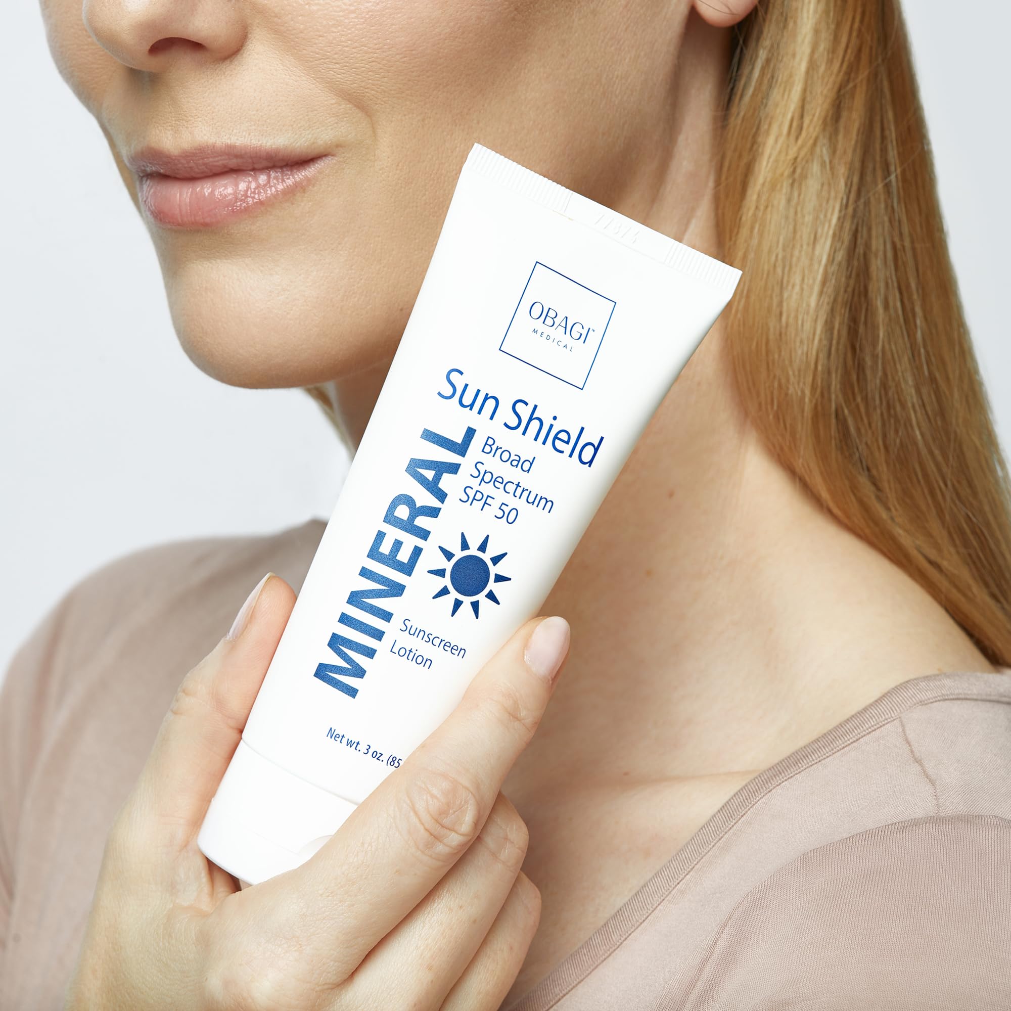 Obagi Sun Shield shown in a morning routine setup for everyday protection.