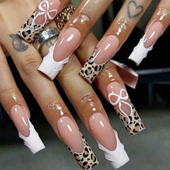 octoswave long square nails with nude pink french tip leopard bow design, perfect for events.