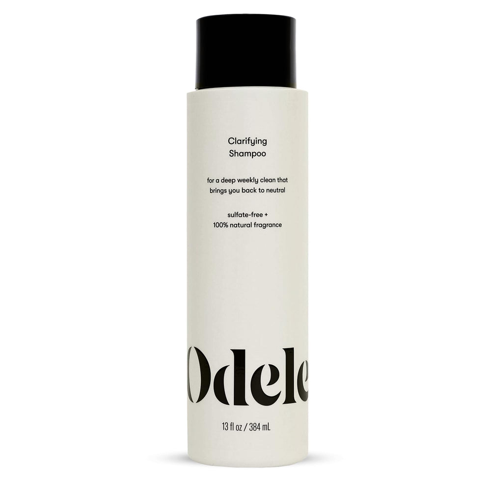 Odele Clarifying Shampoo en bote mostrando limpieza profunda para todo tipo de cabello.