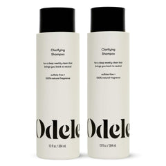 Odele Clarifying Shampoo bottle demonstrates a deep-clean action removing buildup