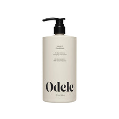 Odele Leave-In Conditioner bottle pour illustrating easy dispensing for quick styling