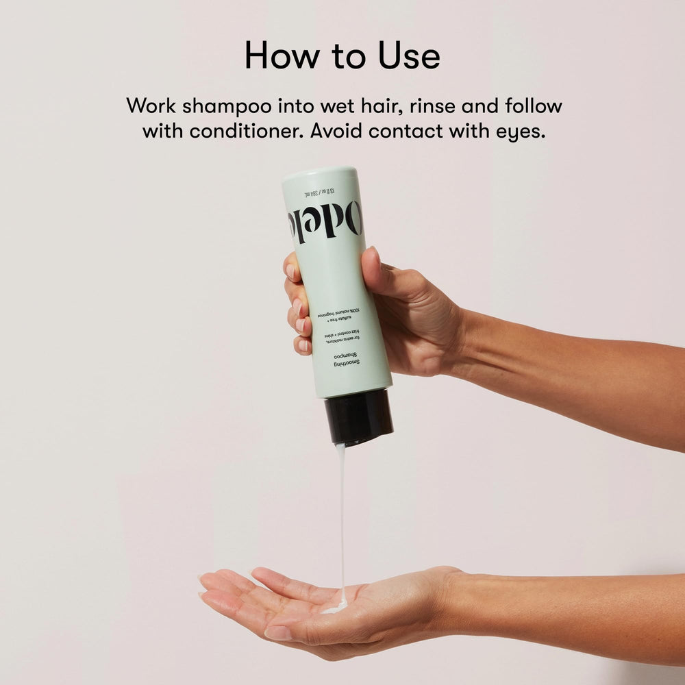 Odele smoothing conditioner being applied to hair for smoother manageability.
