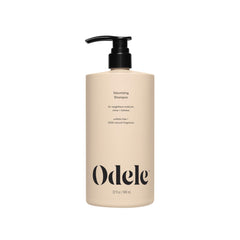 Odele Volumizing Shampoo bottle pour delivers lightweight moisture and radiant shine.