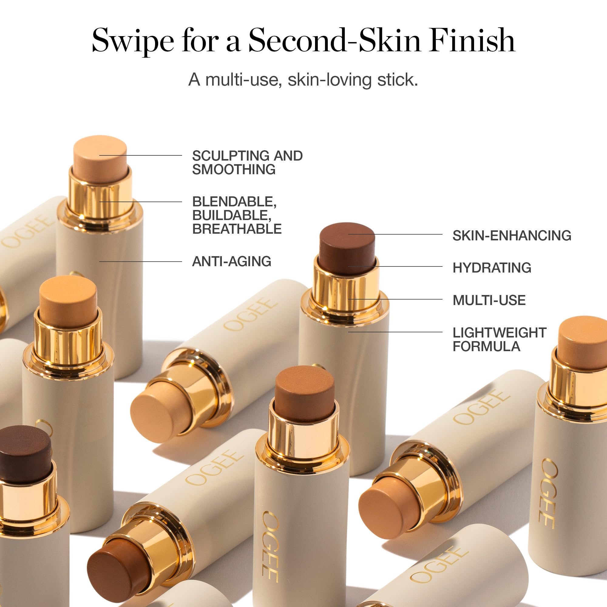 Fingers blending Ogee Foundation Stick on jawline for customizable coverage