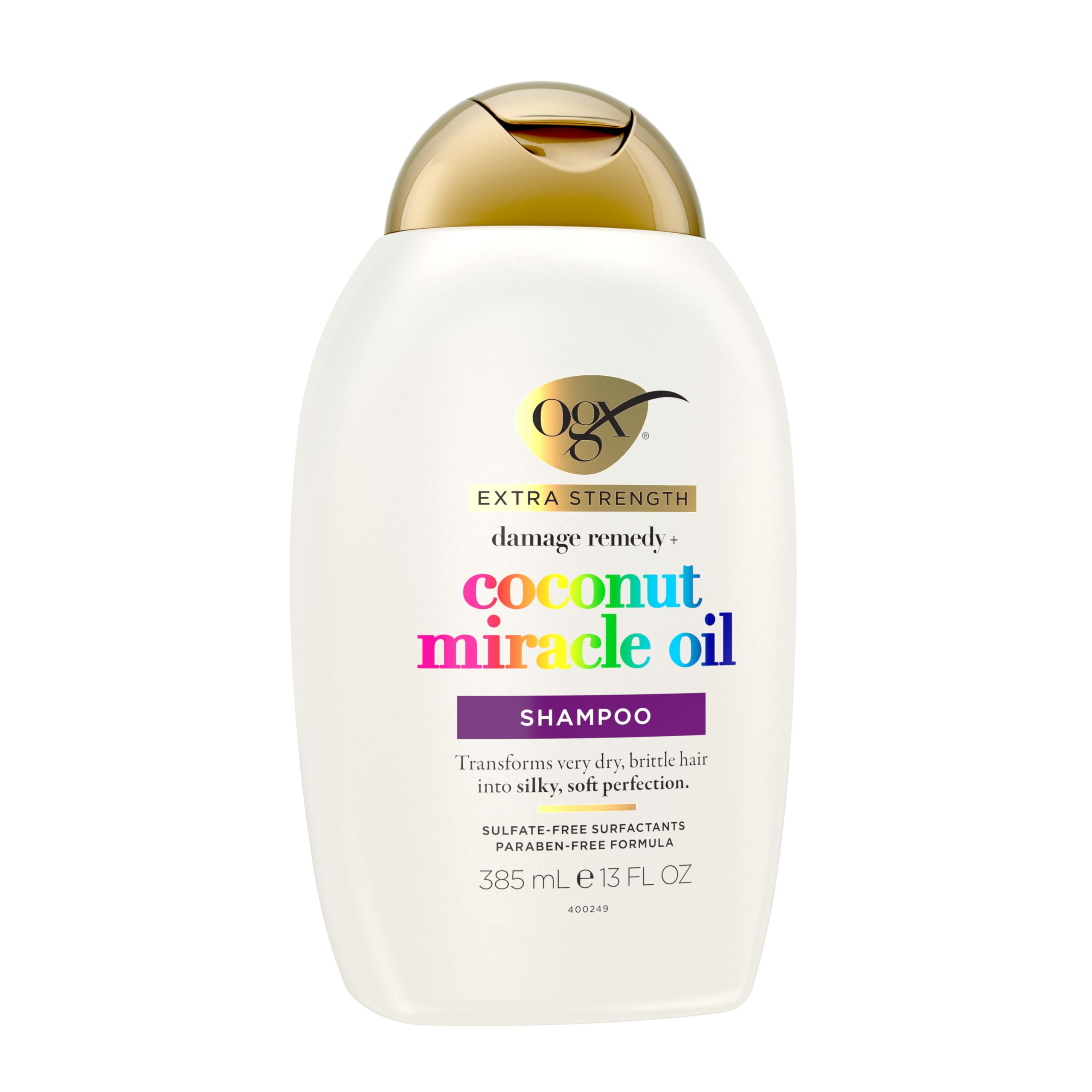 Frizz-control scene with OGX shampoo applied to damp hair.