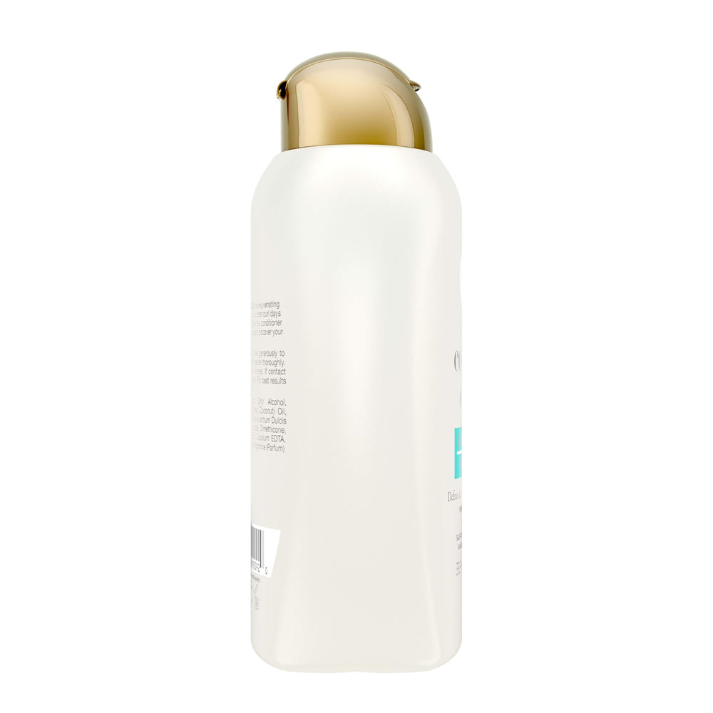 OGX Quenching Coconut Curls conditioner with honey visible for humectant hydration.