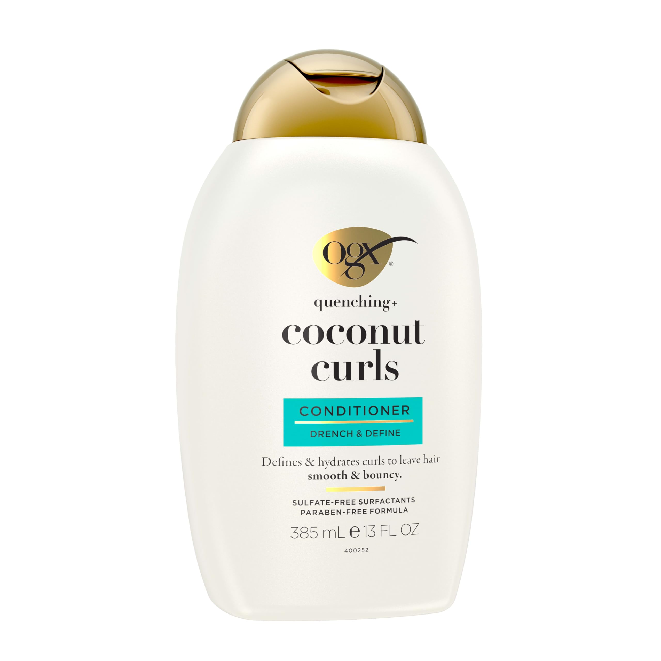 OGX Quenching Coconut Curls conditioner pump closeup shows rich moisturizing formula.