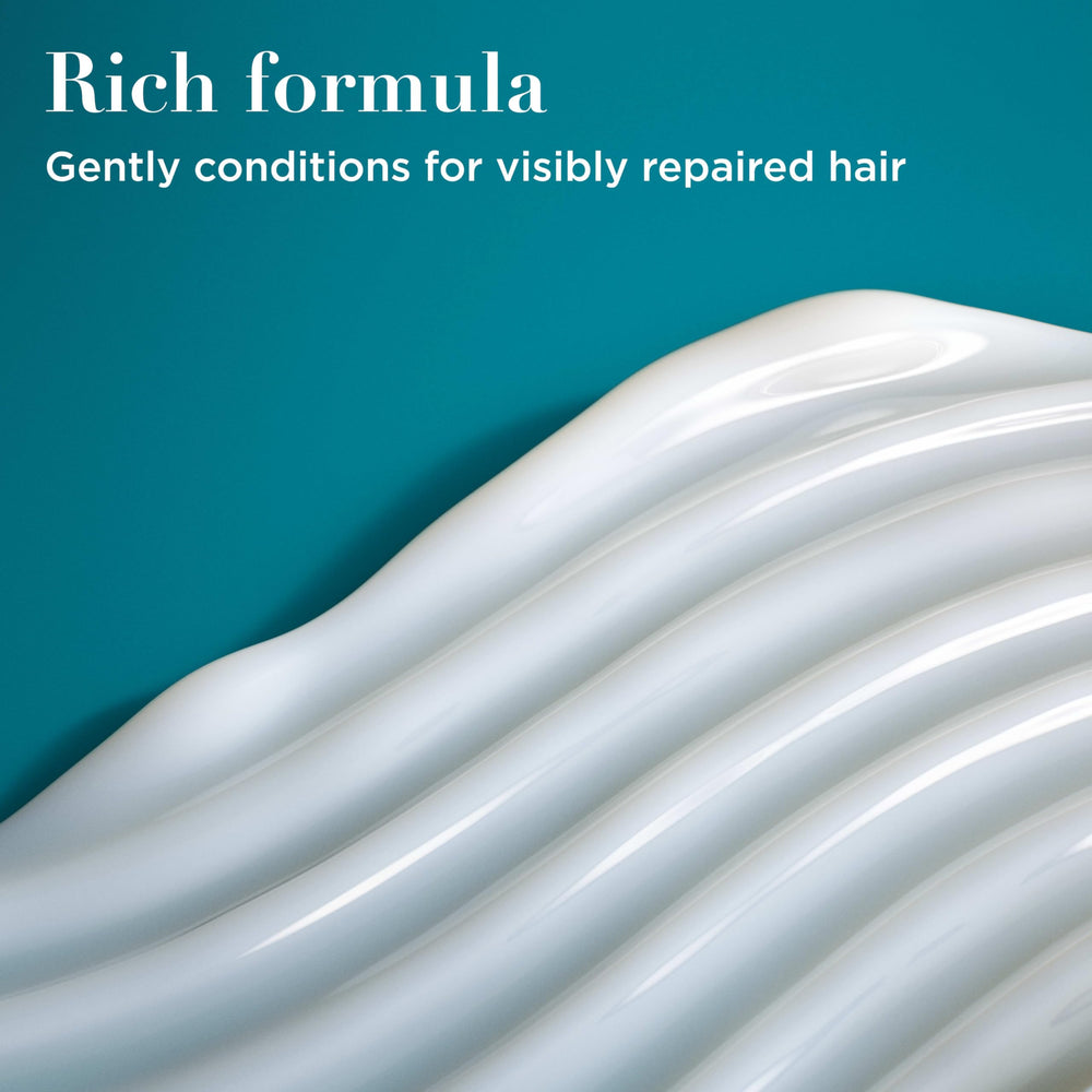 OGX Renewing Argan Oil of Morocco conditioner swatch demonstrates rich hydration