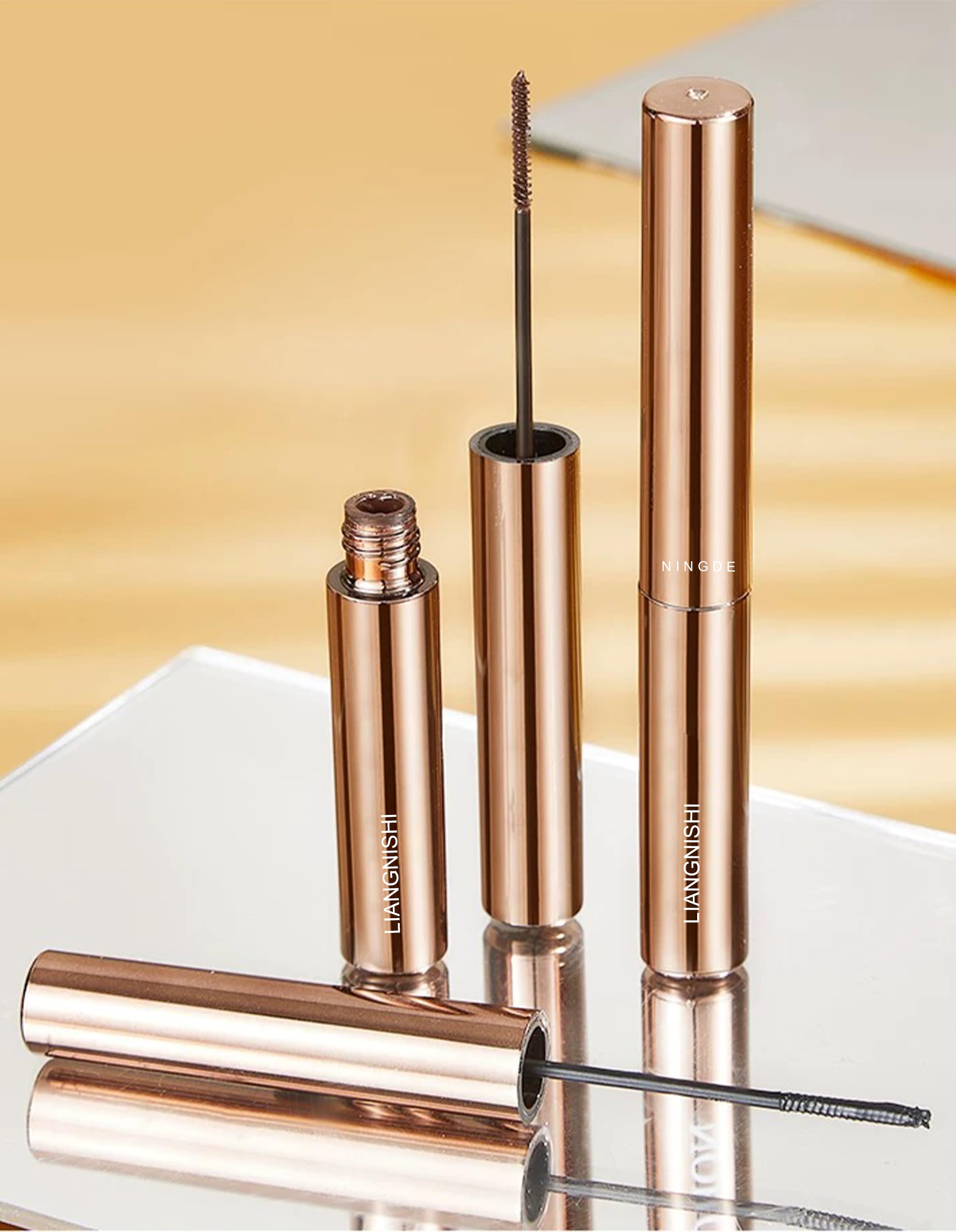 Okerker Brown Mascara defines lower lashes with a slim brush.