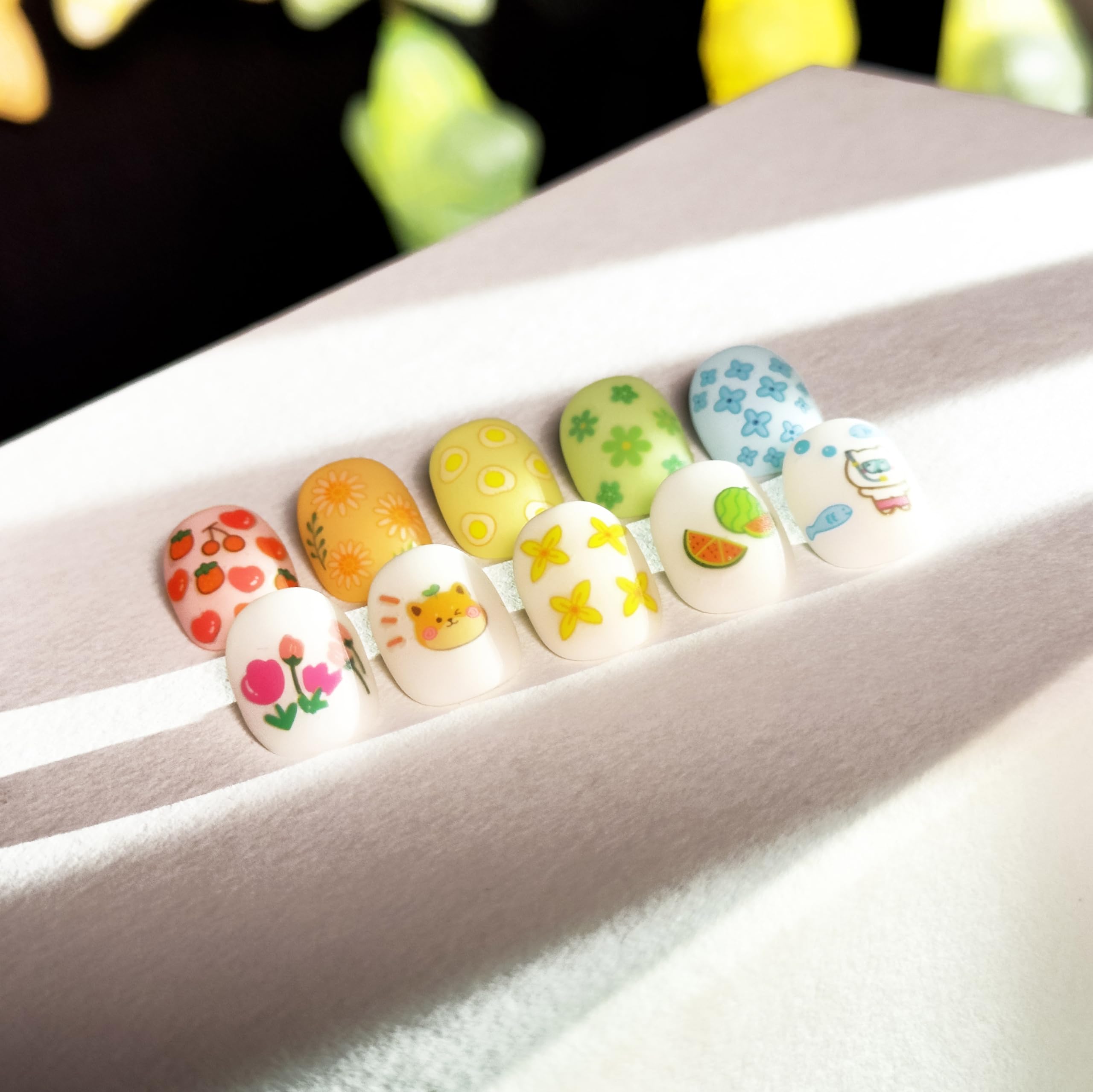 Okiyomi glow-in-the-dark nail stickers design close-up for imaginative after-dark play.