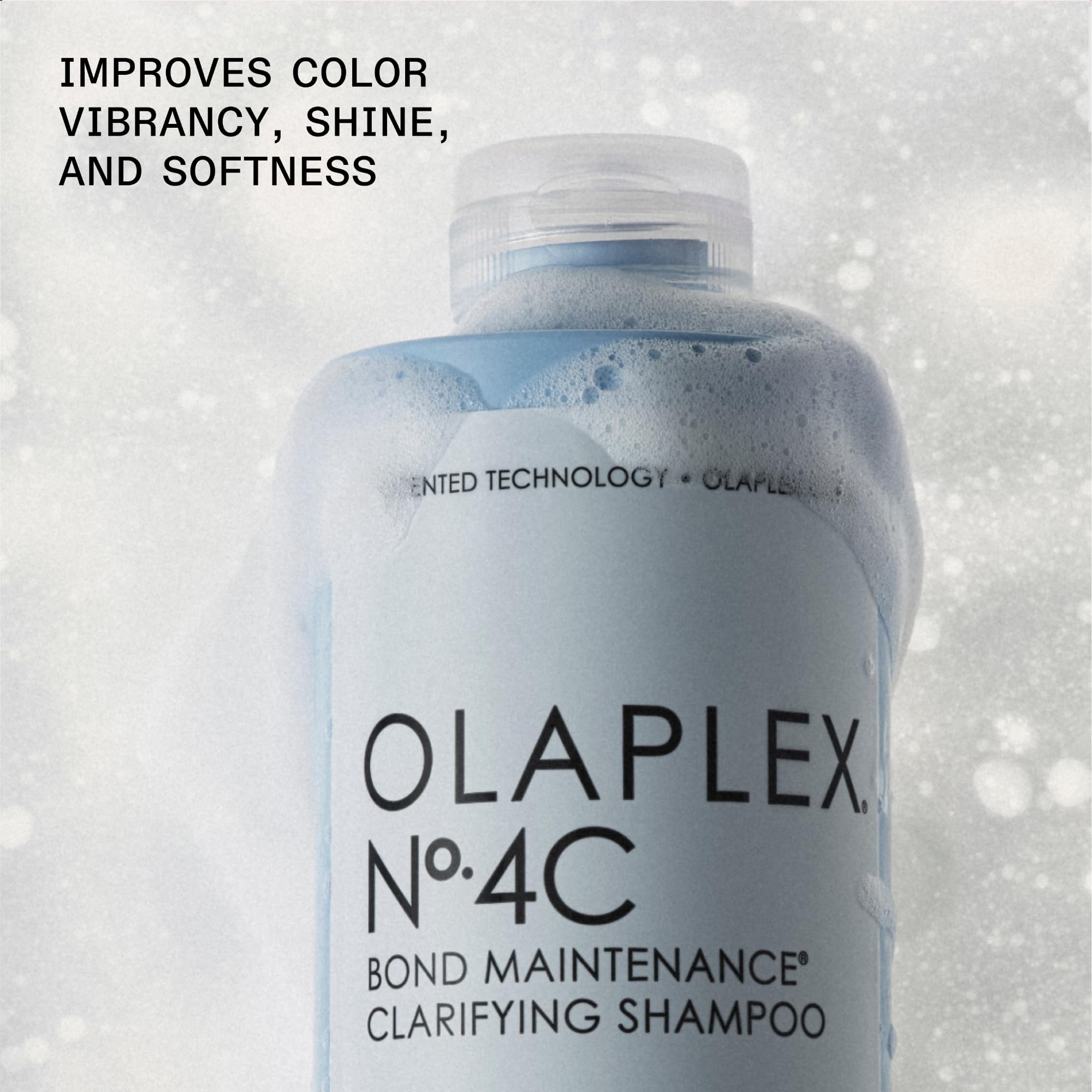 Olaplex 4C label closeup highlights a color safe clarifier for mineral removal.