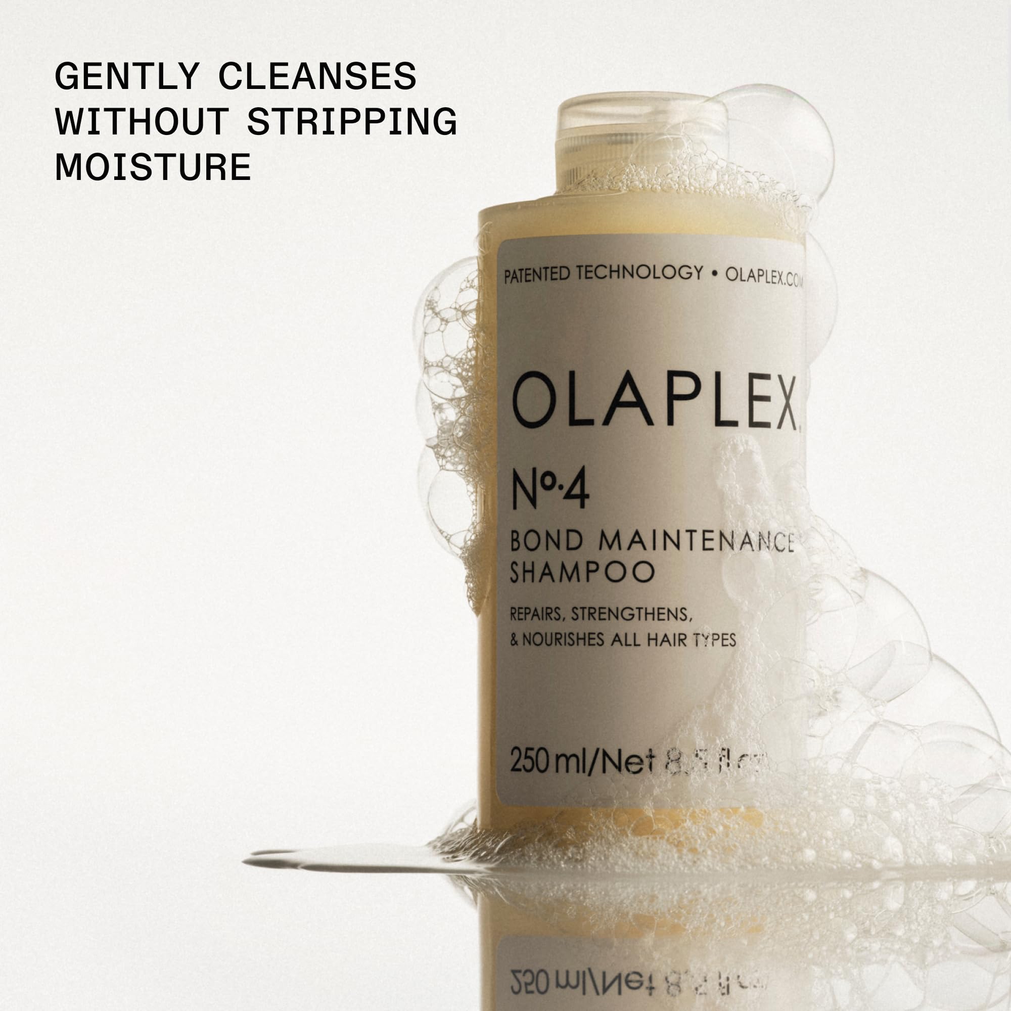 Olaplex Bond Maintenance Shampoo on color-treated hair, emphasizing shine and manageability.
