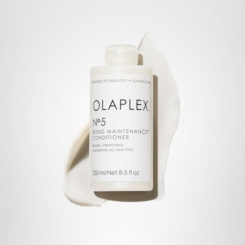 Nº5 bottle beside hair tools, suggesting routine integration.