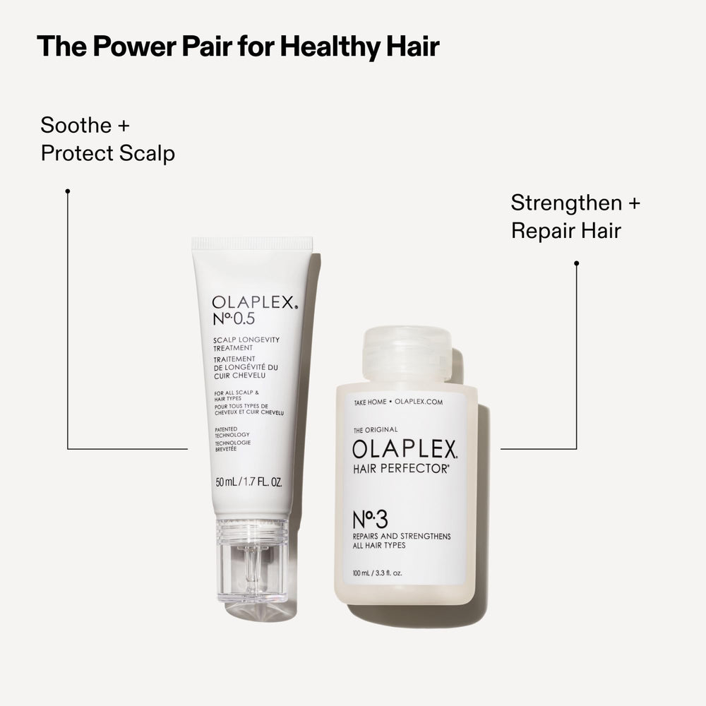 Olaplex No. 0.5 serum drop on finger for precise application