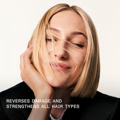 Olaplex No.3 in hand demonstrating an easy at-home treatment