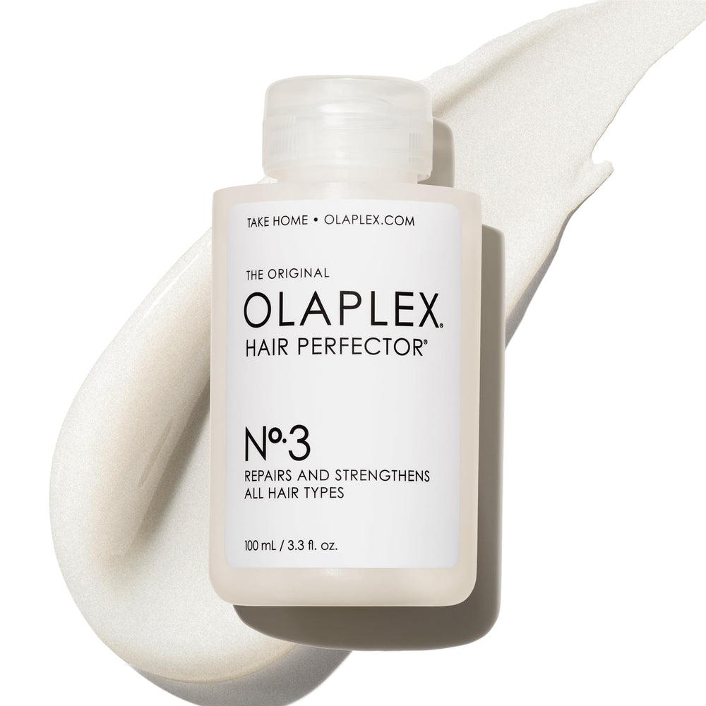 Olaplex No.3 bottle pouring to show bond rebuilding at home