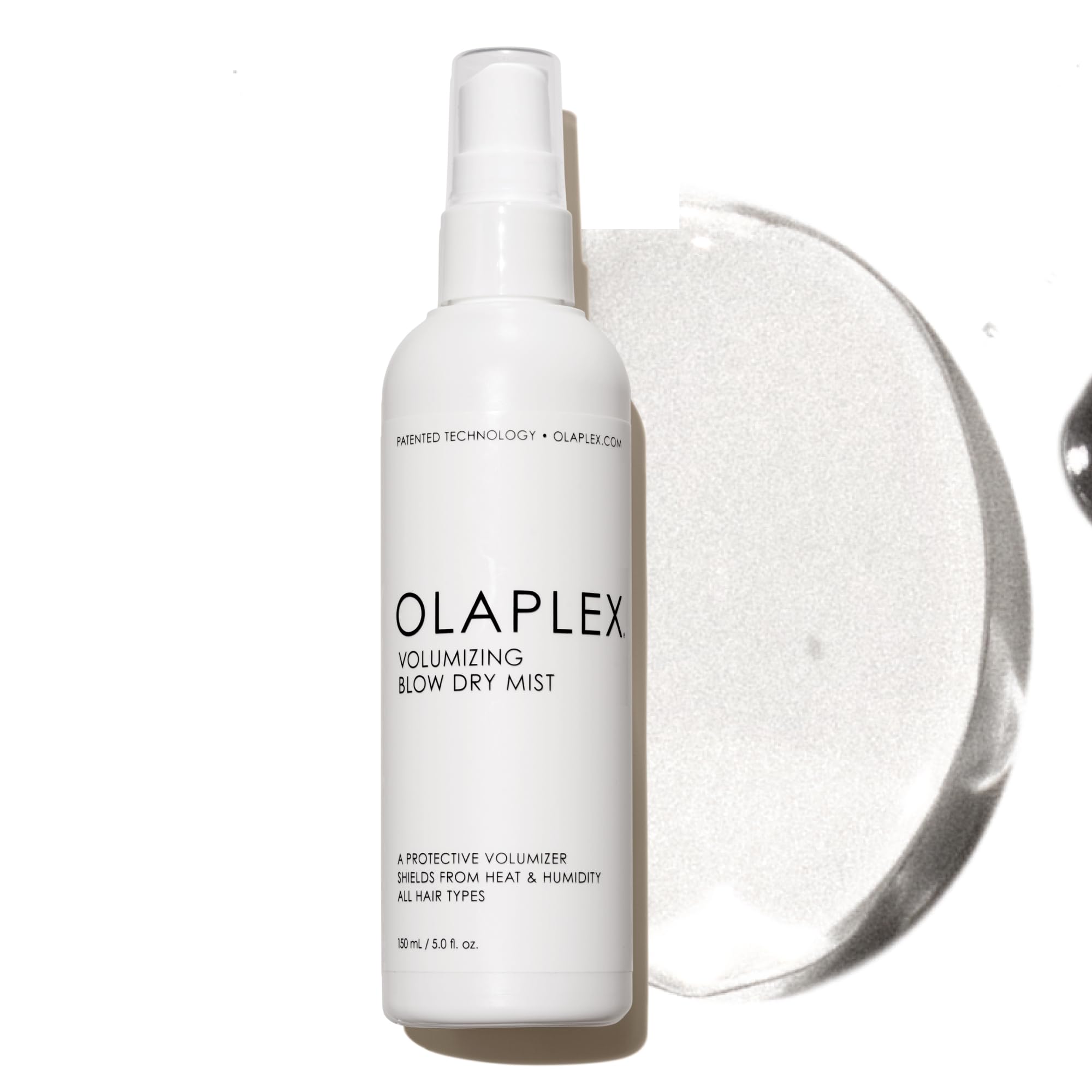 Olaplex Volumizing Blow Dry Mist bottle delivering weightless volume for bouncy hair