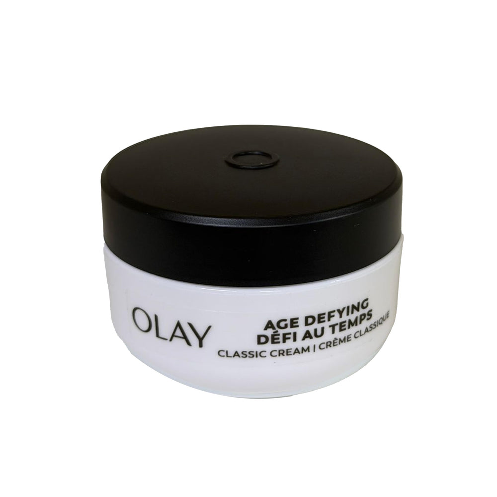Olay Age Defying Renewal applying on face, delivering refreshing feel.