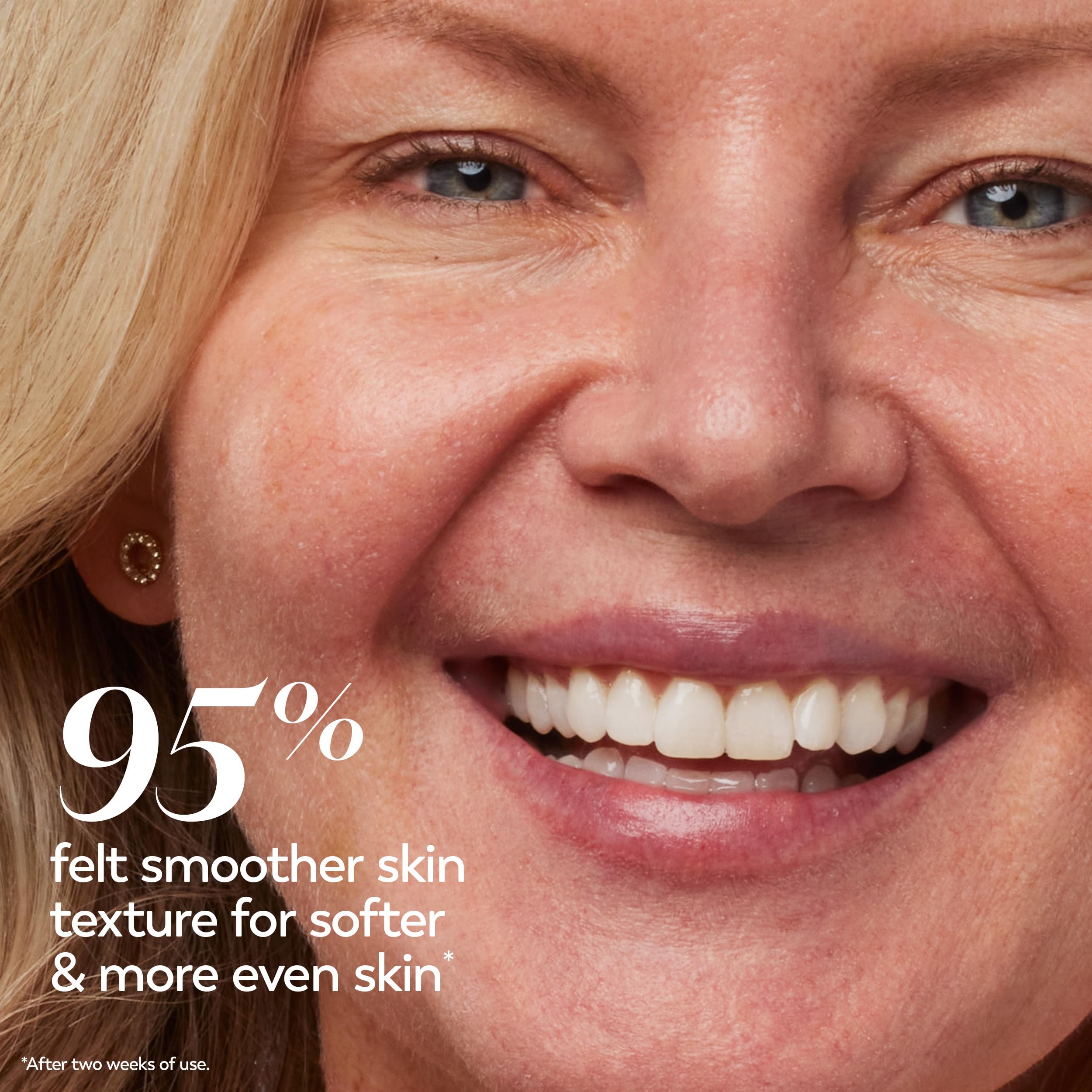Close-up texture of OLAY Collagen Peptide Cream spreading on skin.